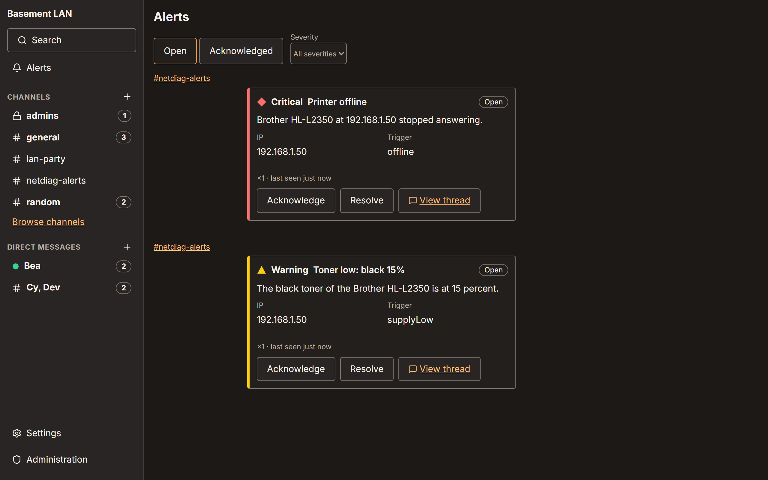 The Alerts view: a critical printer-offline alert and a toner-low warning, both open, with Acknowledge and Resolve buttons